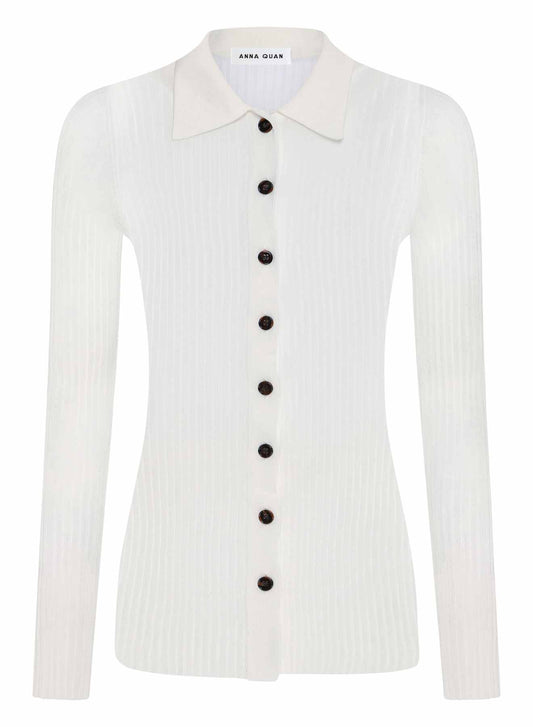 ANNA QUAN'S Sheer Long Sleeve Knit Top, a versatile addition to any knitwear collection. Adorned with mother-of-pearl buttons, this top is perfect for both casual and workwear occasions. Sheer knitwear, button down knitwear, button down top, knit top, sheer knit top, longsleeve knit top.