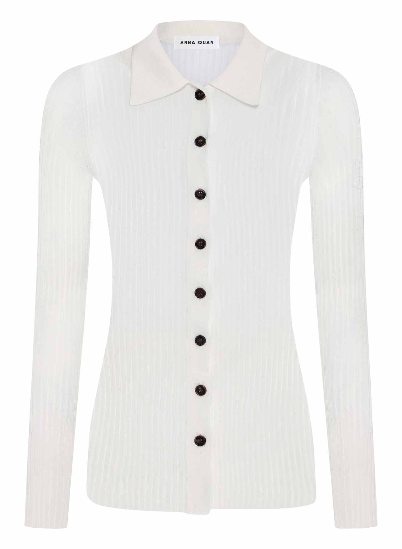 ANNA QUAN'S Sheer Long Sleeve Knit Top, a versatile addition to any knitwear collection. Adorned with mother-of-pearl buttons, this top is perfect for both casual and workwear occasions. Sheer knitwear, button down knitwear, button down top, knit top, sheer knit top, longsleeve knit top.