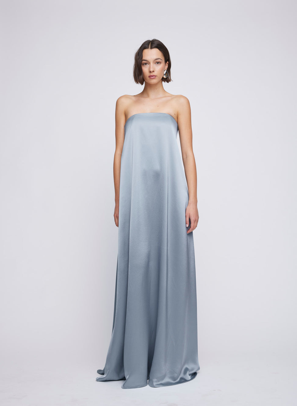 ANNA QUAN strapless bodice satin steel drape maxi dress with pockets. Long line maxi dress, event dress, event wear, event dresses, wedding dress, wedding dresses, steele blue maxi dresses, steele blue maxi event dresses, formal dress, formal dresses, formal maxi dresses.