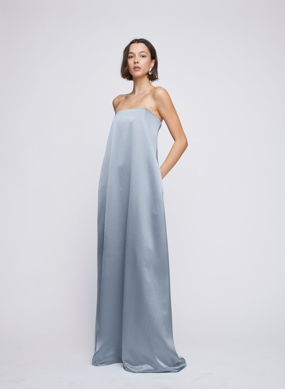 ANNA QUAN strapless bodice satin steel drape maxi dress with pockets. Long line maxi dress, event dress, event wear, event dresses, wedding dress, wedding dresses, steele blue maxi dresses, steele blue maxi event dresses, formal dress, formal dresses, formal maxi dresses.