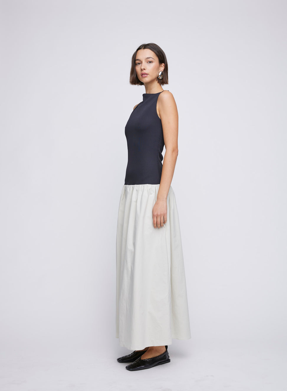 Dress up in style with ANNA QUAN'S Boat Neck Mixed Media Dress ‚Äö√Ñ√¨ a perfect blend of sophistication and comfort. The boat neck adds a touch of elegance to this versatile piece, ideal for a variety of occasions - easily taking you from day to dinner. Dinner dress, day dress, every day dress, mixed media dress, cotton skirt, stretch top.