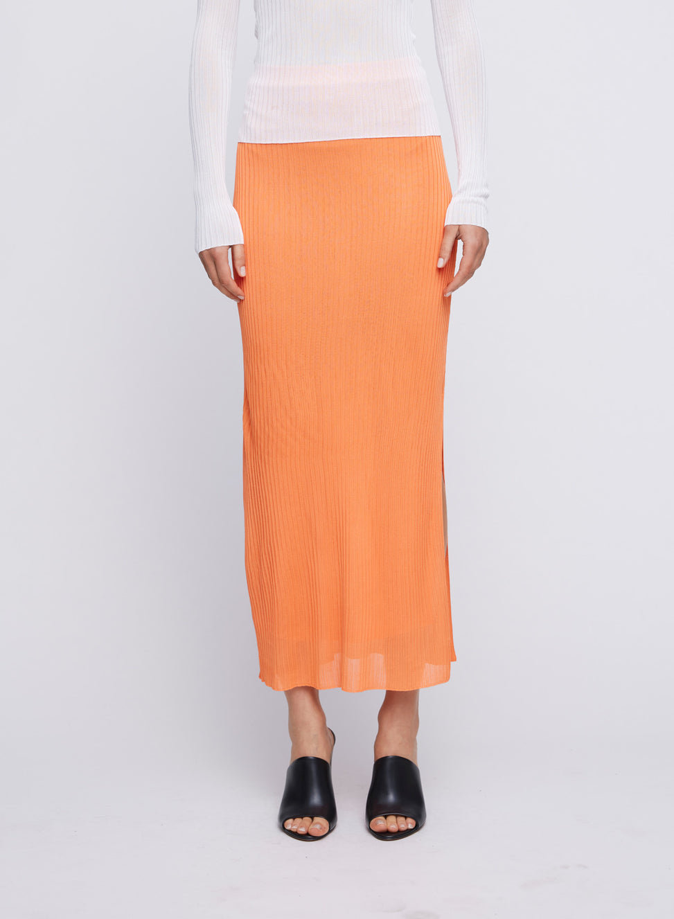 Sheer Tube Skirt with side split and elastic waist. Lightweight knit skirt, knit midi skirt, every day knit skirt, everyday knit skirt, easy to wear skirts.