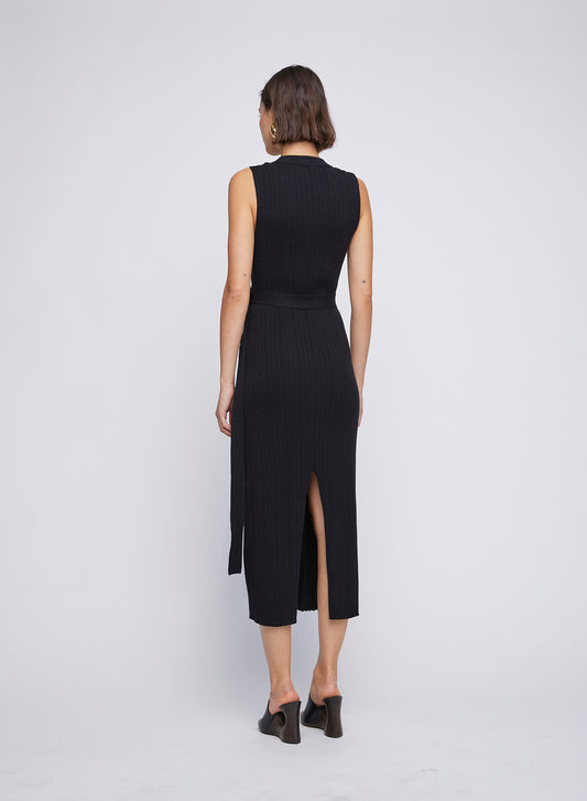 ANNA QUAN Sleeveless Crew Neck Dress with ring belt detail. Effortlessly chic, this dress is perfect for any occasion. The modern design and flattering silhouette make it a versatile wardrobe essential. Midi knit dress, everyday knit dress, everyday sleeveless knit dress with waist belt and ring loop.